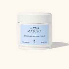 Hawa Matcha container with a light blue label with a cream-colored background